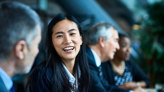 people chatting in meeting